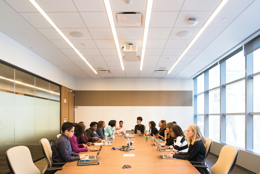 Professionals collaborating around a meeting table
